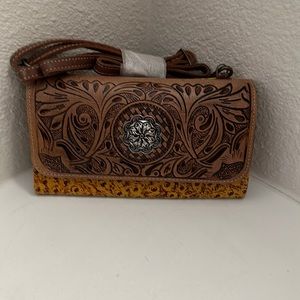 Brand new Myra crossbody wallet or wristlet